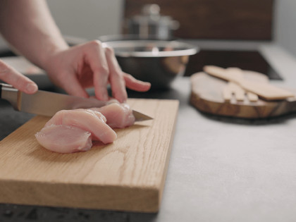 How can I avoid food poisoning when cooking at home?