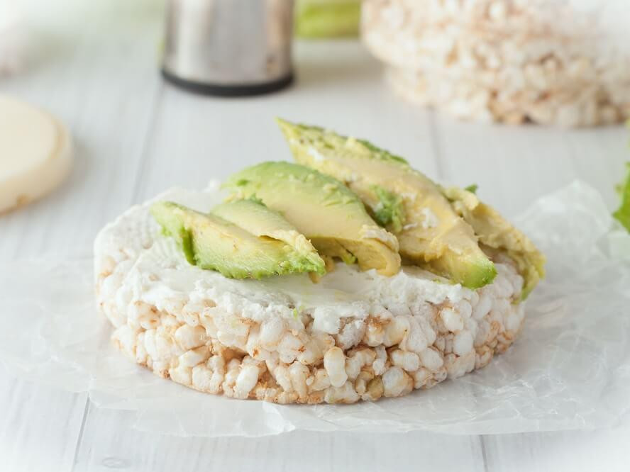 Rice cake with avocado and cream cheese